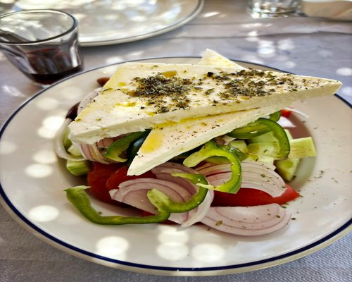 Fresh Greek salad with tomatoes, cucumber, feta cheese and olive oil